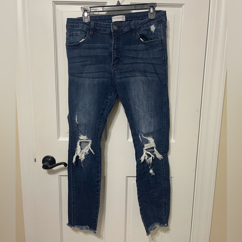 Distressed pink lily jeans.